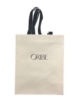 {{photo.Alt || photo.Description || 'Фирменный бумажный пакет Oribe Paper Bag'}}
